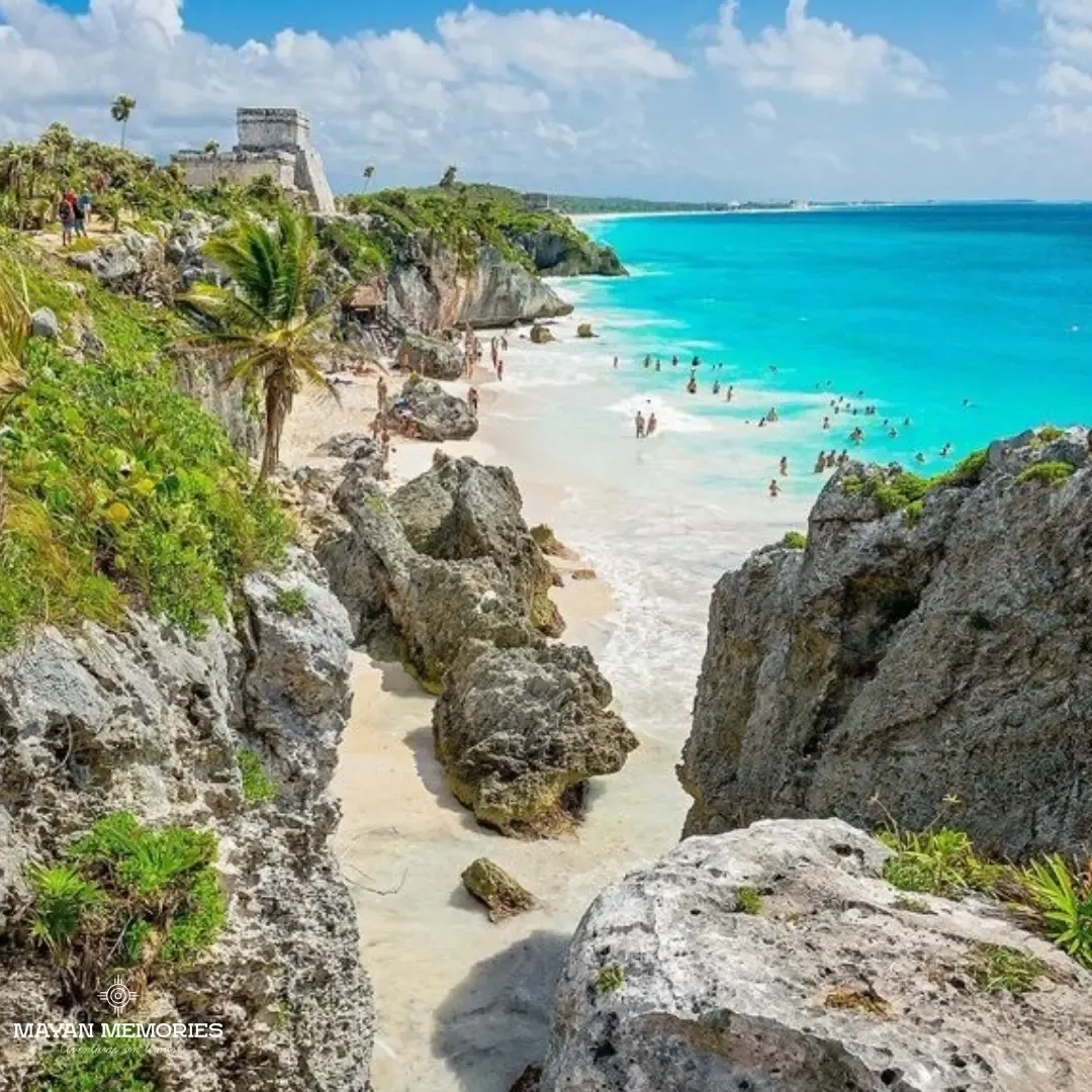 Tulum beach between rocks with turquoise water