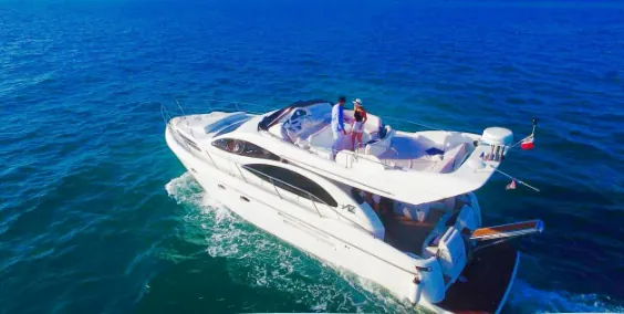 Azimut yacht cruising the blue sea, seen from above