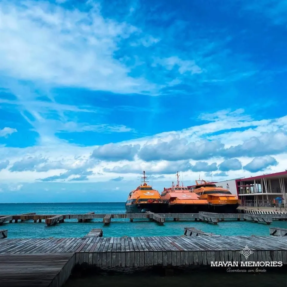 Ferry docked at the pier on the turquoise sea