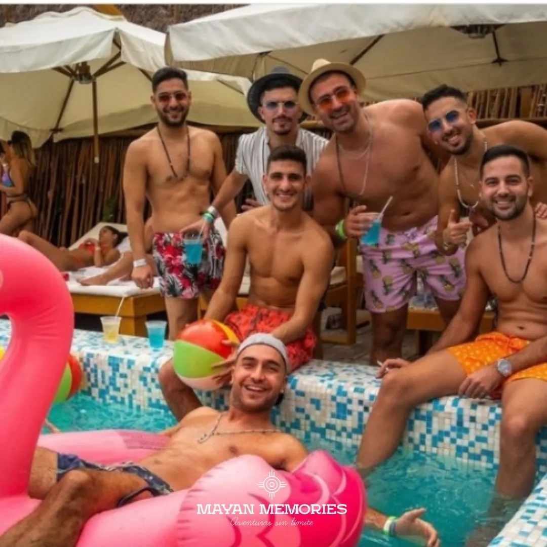 Group of friends posing at the pool bar
