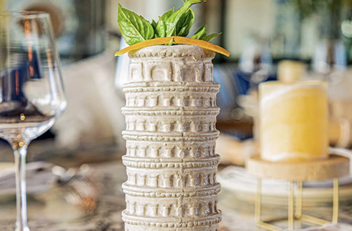 Drink in a glass shaped like the Leaning Tower of Pisa