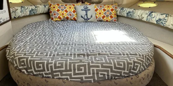 Cabin bed with anchor-print cushions