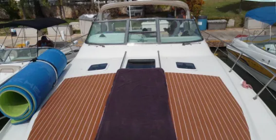 Yacht bow with a sun pad at the marina