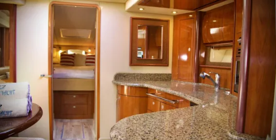 Yacht's interior galley with wood finishes