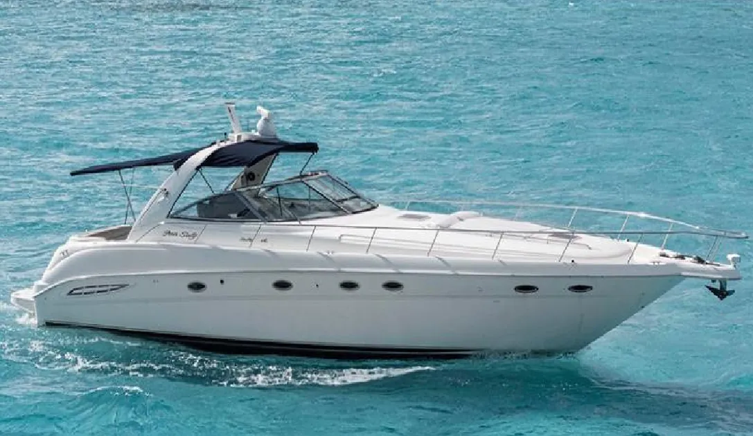 White Sea Ray yacht on turquoise water