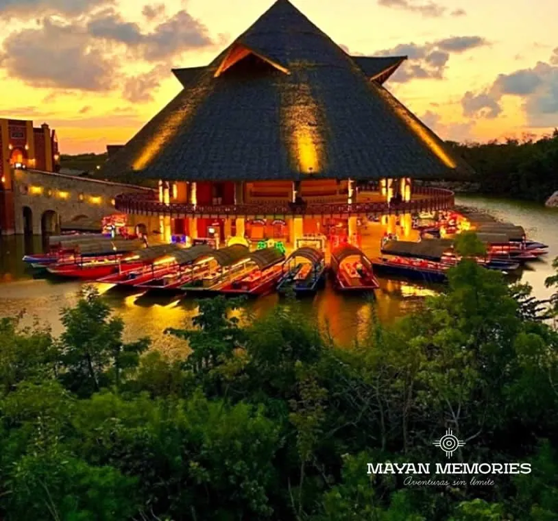 Lit trajineras on the Xoximilco canals at night